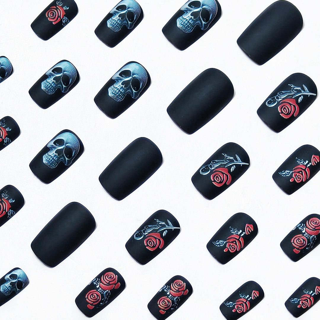 Creative nail art with skull and rose designs Bowlift