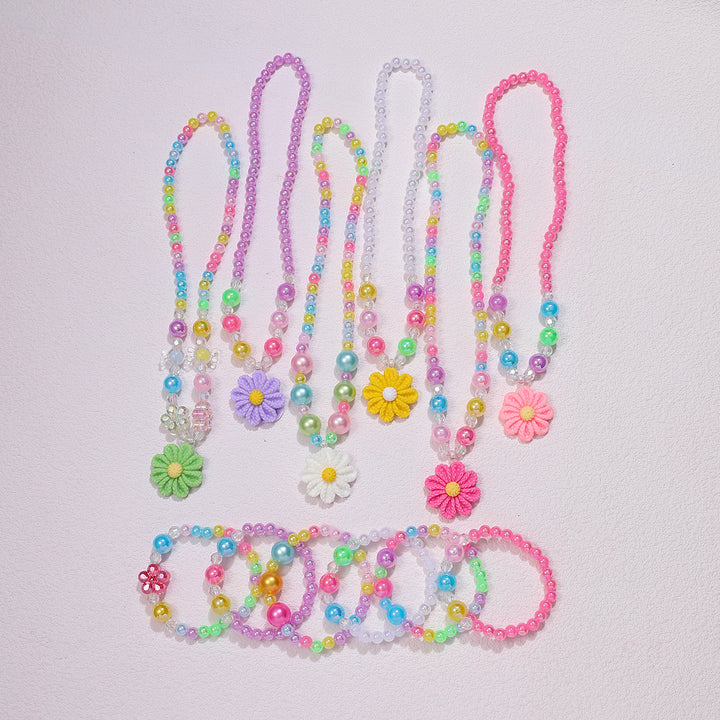 Playful jewelry set with flower pendant Bowlift
