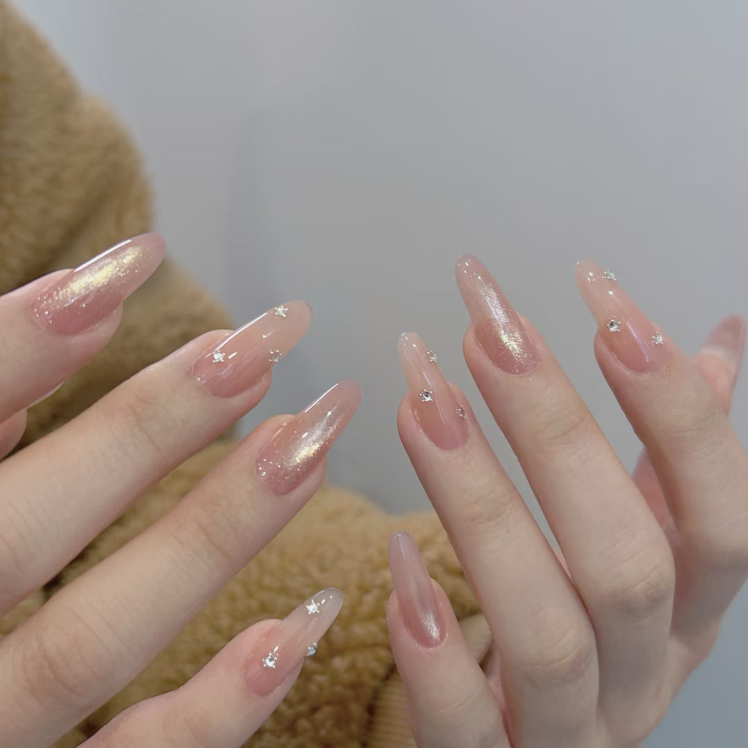 Elegant artificial nails with glitter accents Bowlift