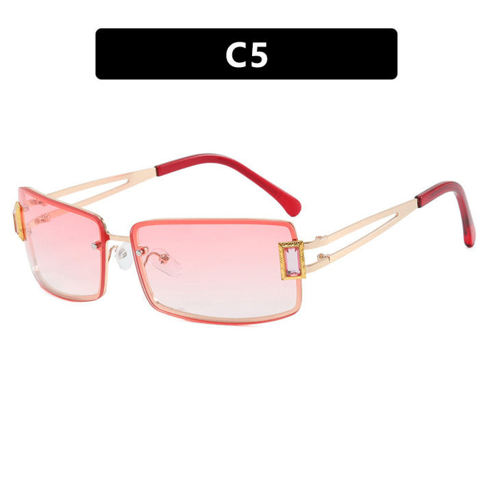 Ladies stylish sunglasses with elegant trapezoidal lenses and filigree metal frame Bowlift
