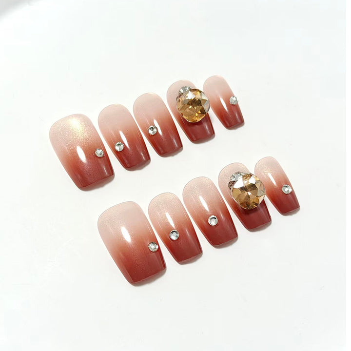 Artificial nail set with glittering rhinestone applications Bowlift