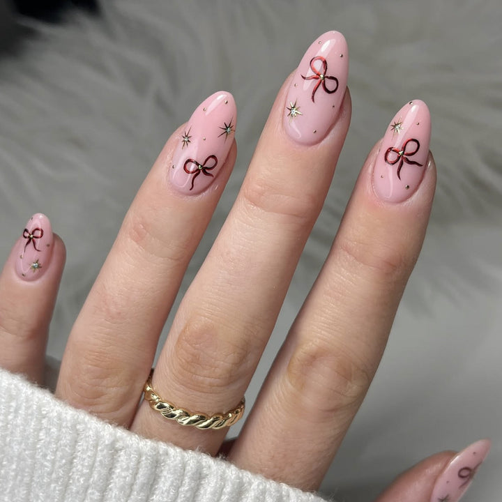 Stiletto Nail Art Extensions with Bow Accents Bowlift