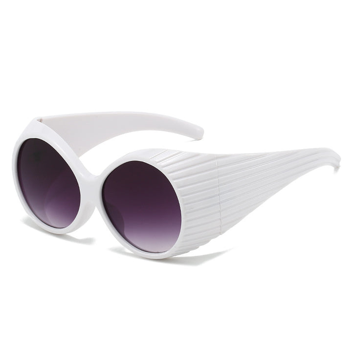 Women's extravagant sunglasses with unique wave design Bowlift