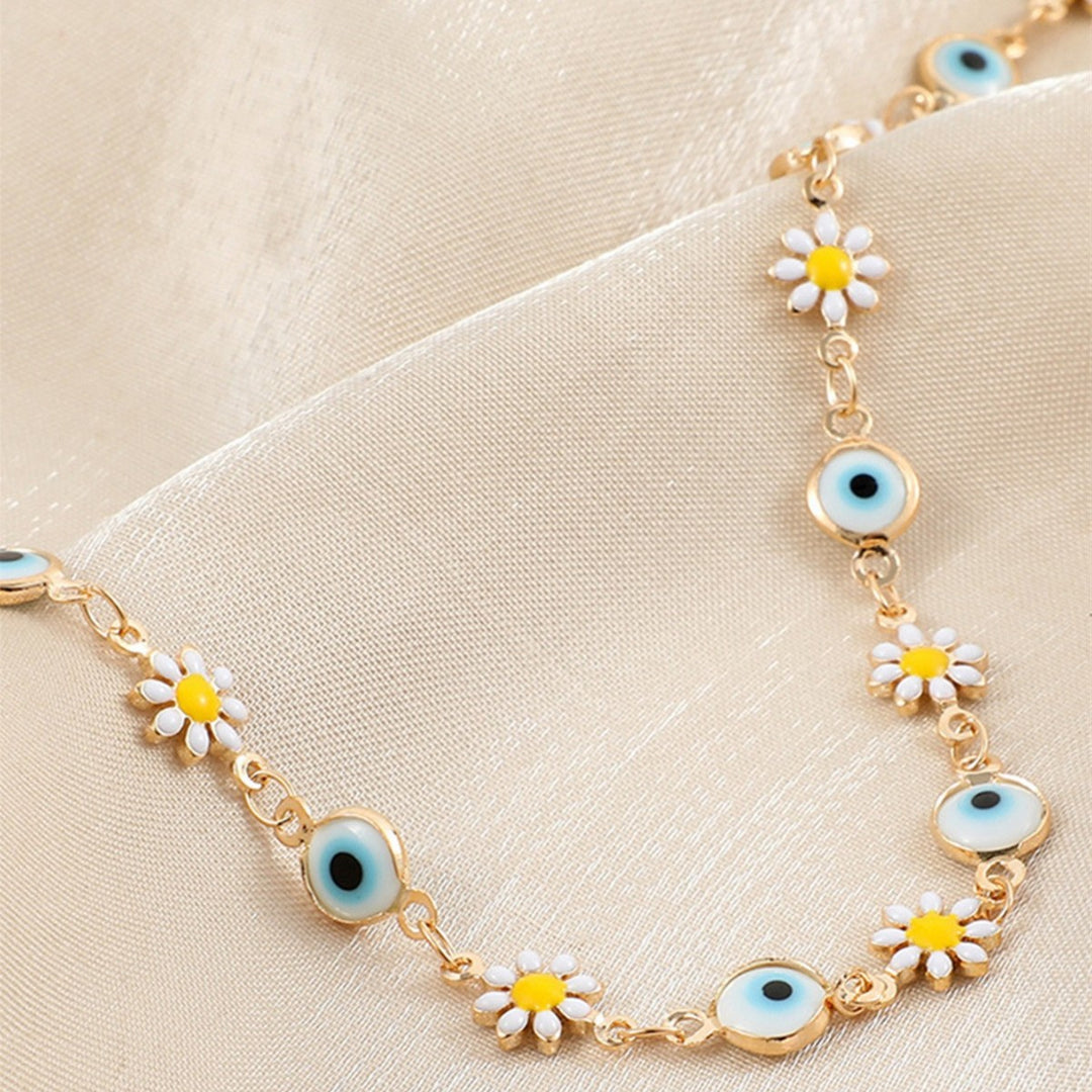 Flower and Eye Charm Bracelet Bowlift