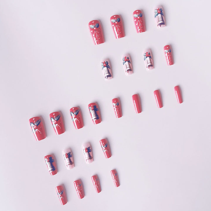 Artificial nail set with festive Christmas design and glitter details Bowlift