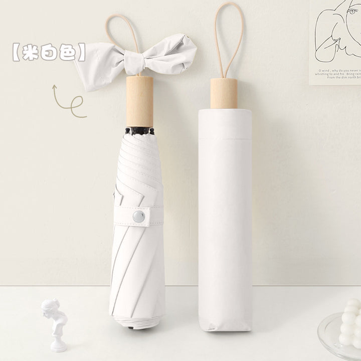 Women's elegant folding umbrella with innovative design Bowlift