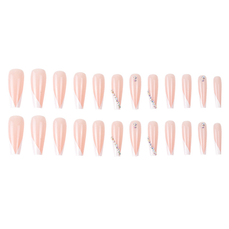 Glamorous Stiletto Nail Extensions with Rhinestone Accents Bowlift