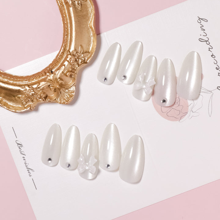Elegant Stiletto-Shaped Press-On Nails with Decorative Bow Accents Bowlift