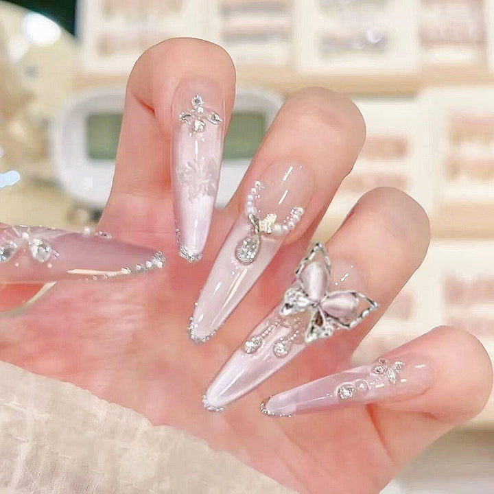 Artistic Stiletto Press-On Nail Art with Glimmering Accents Bowlift