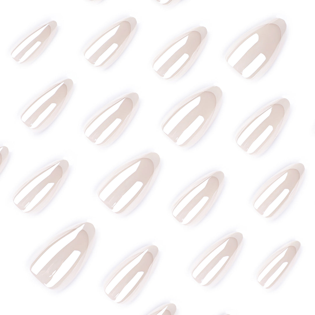 Artistic stiletto nails with elegant French tip embellishments Bowlift