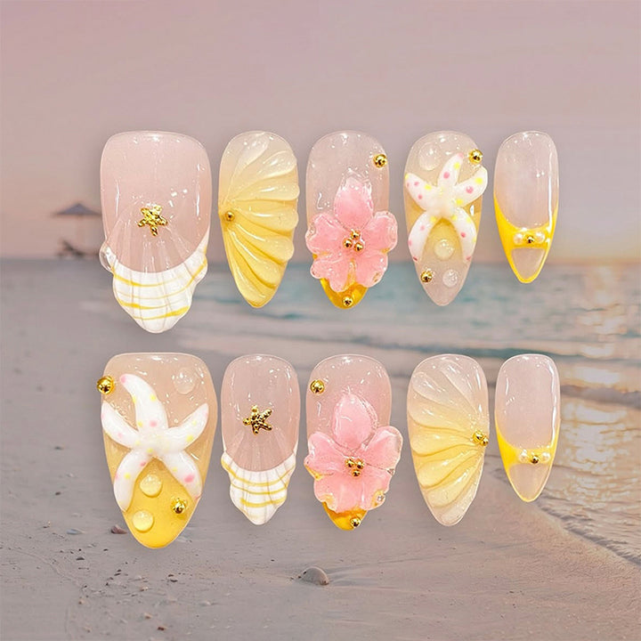 Artificial nail set with glamorous floral designs and creative glitter accents Bowlift