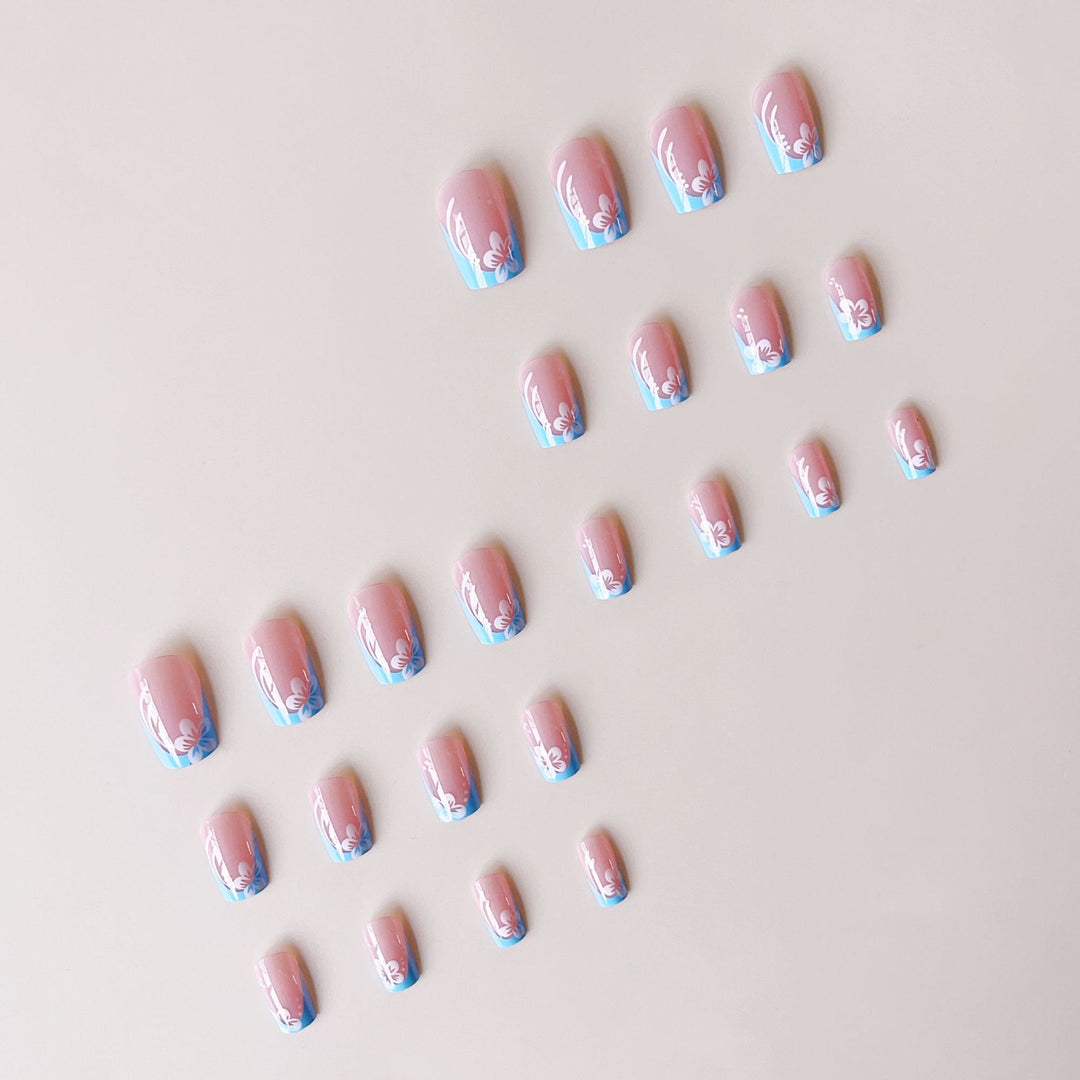 Acrylic nail set with floral designs and elegant tips Bowlift