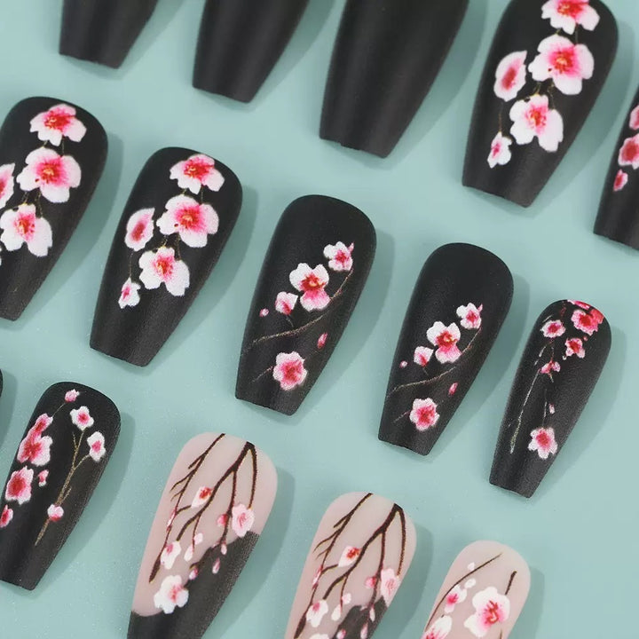Artificial nail set with floral accents and matte finish Bowlift