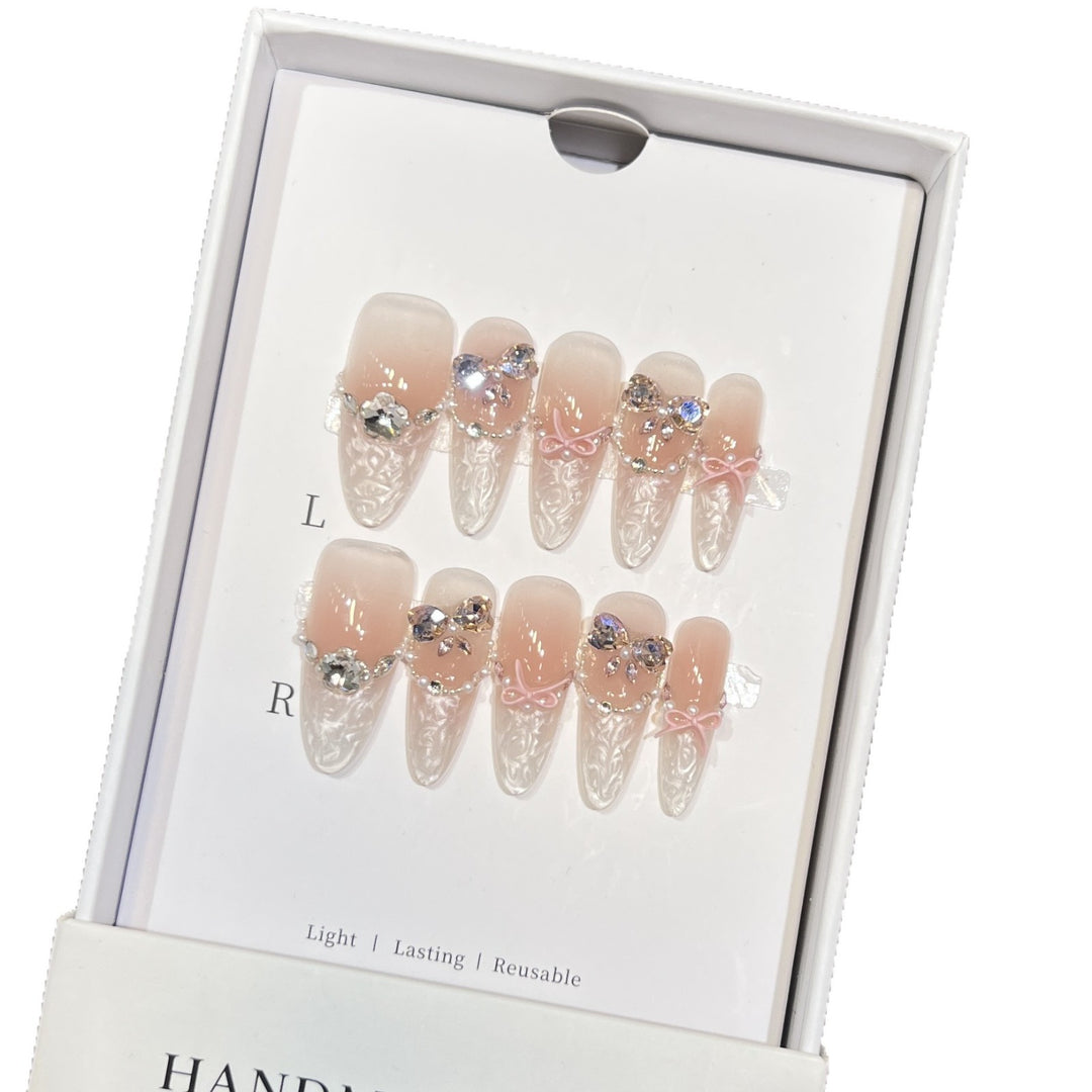 Decorative Stiletto Press-On Nail Set with Bow and Gem Accents Bowlift