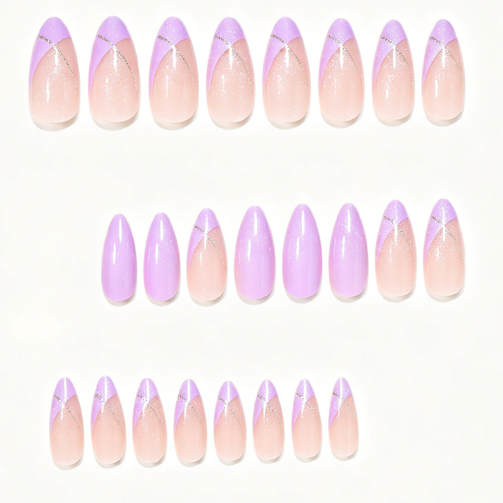 Stiletto Nail Art Tips with Gold Accents Bowlift