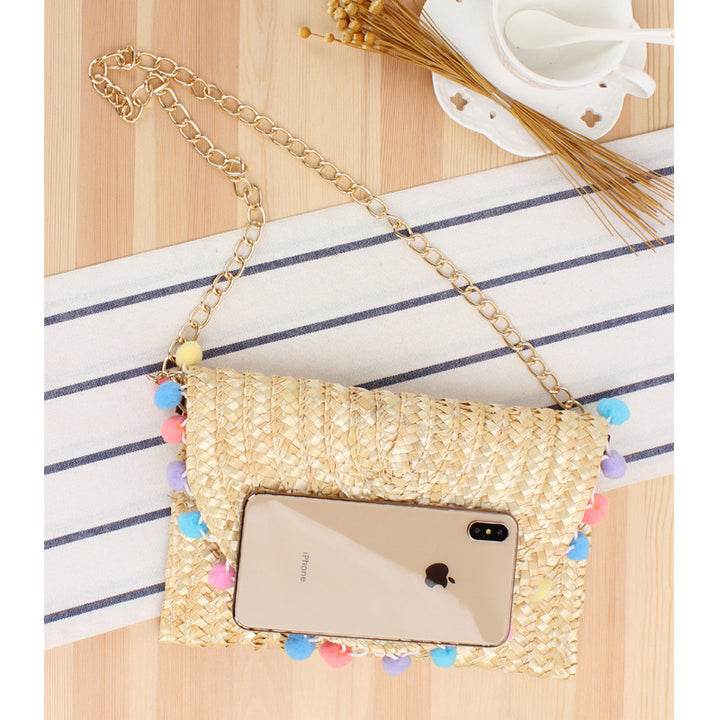 Clutch Bag Made of Handwoven Straw with Decorative Pompons Bowlift