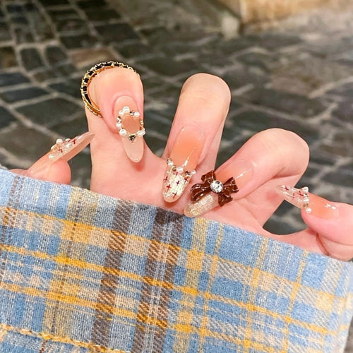 Decorative Bow and Gemstone Press-On Nails Bowlift