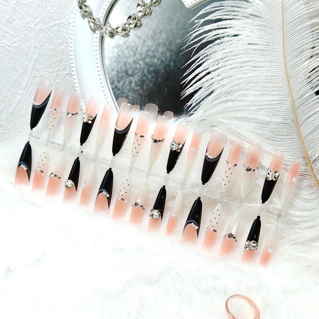 Glamorous artificial nails with glitter accents Bowlift