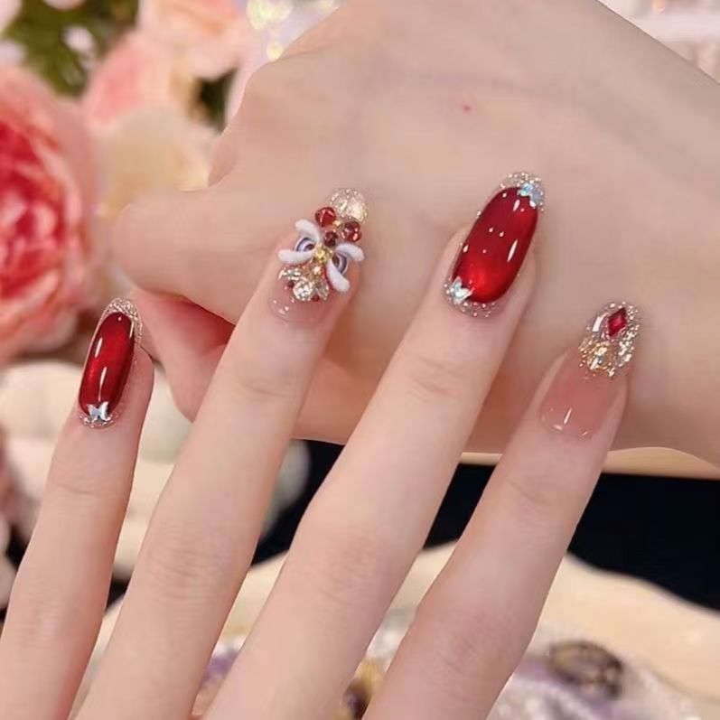 Artistic Rhinestone-Embellished Nail Extensions Bowlift