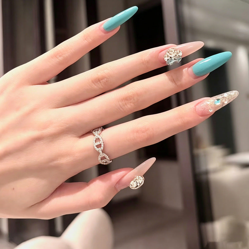 Artificial nail set with glamorous 3D applications and sparkling design Bowlift