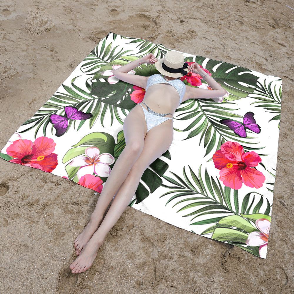Beach blanket with tropical floral design Bowlift