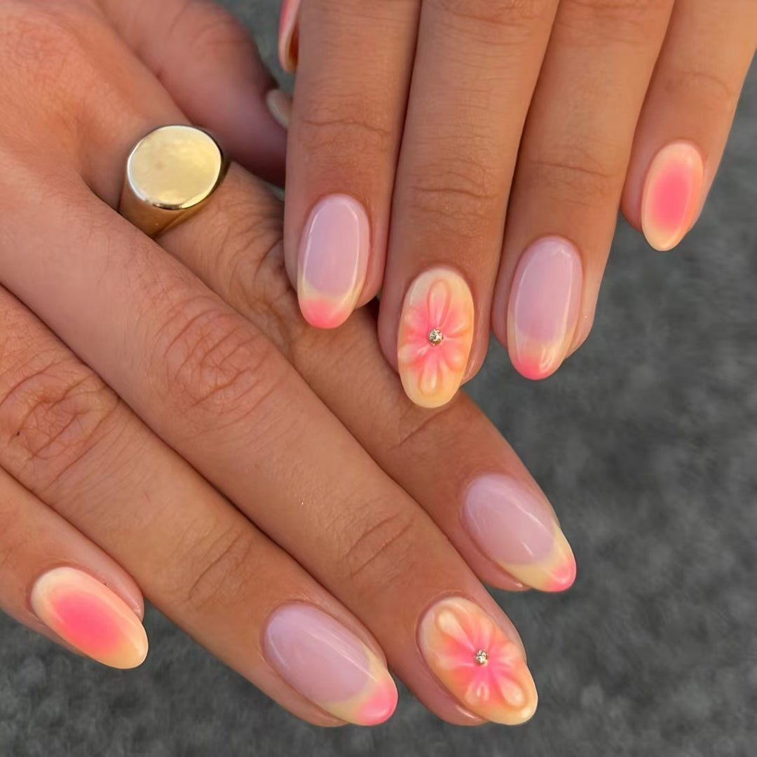 Artistic Almond-Shaped Press-On Nails with Floral Accents Bowlift