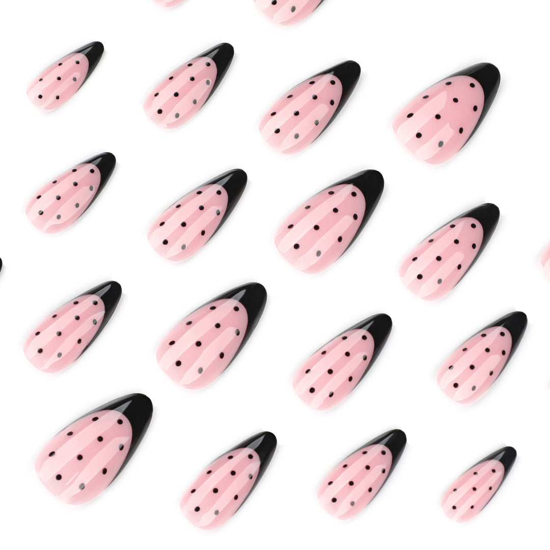 Artistic stiletto nails with black dot pattern Bowlift