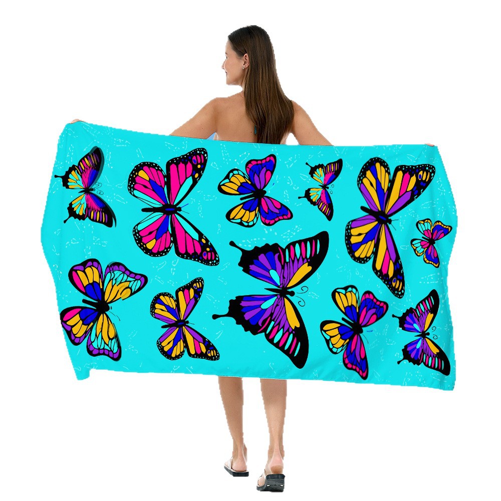 Beach towel with vibrant, colorful animal motif Bowlift