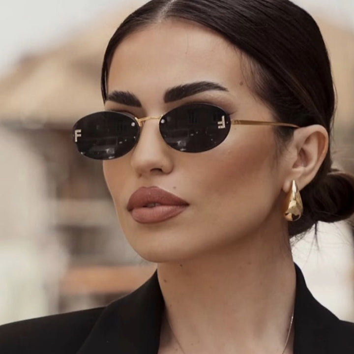 Women's fashionable sunglasses with elegant, round lenses and delicate metal frame Bowlift