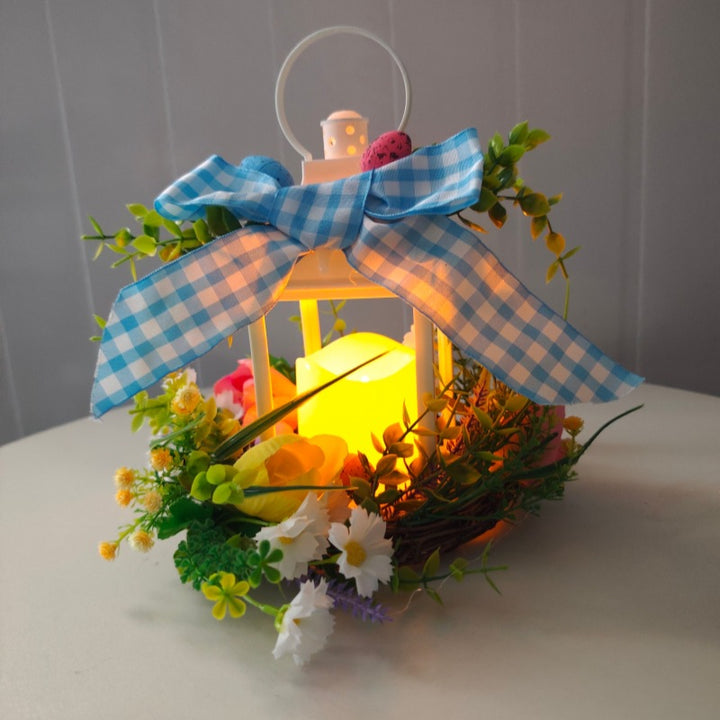 Decorative table lantern with artificial flowers and ribbon Bowlift