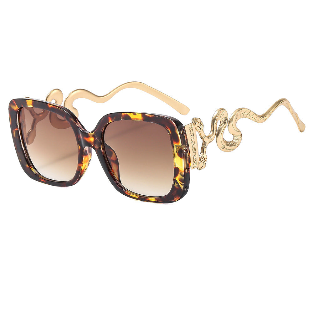 Women's extravagant designer sunglasses with luxurious snake frame Bowlift