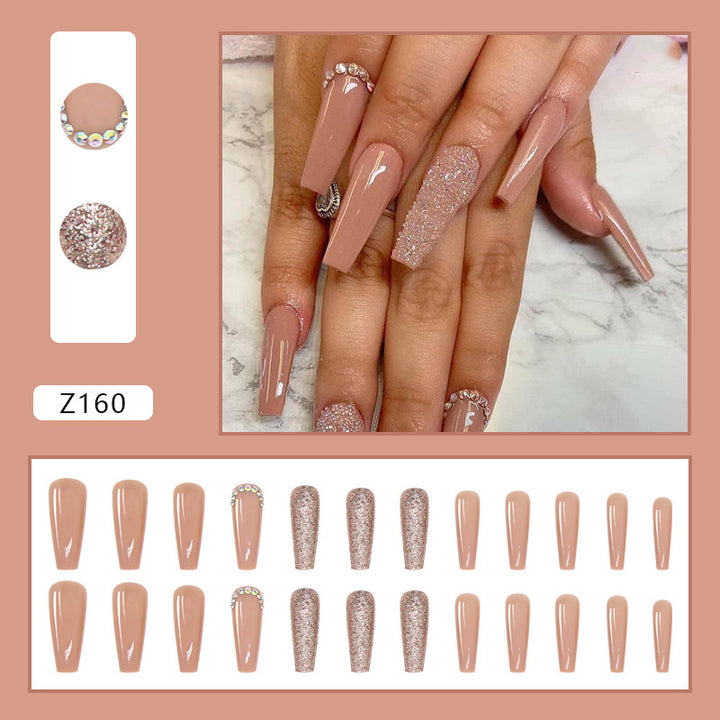 Glamorous artificial nail extensions with rhinestone and glitter details Bowlift