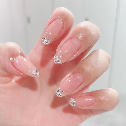 Elegant Nail Art with Glitter and Rhinestone Decorations Bowlift