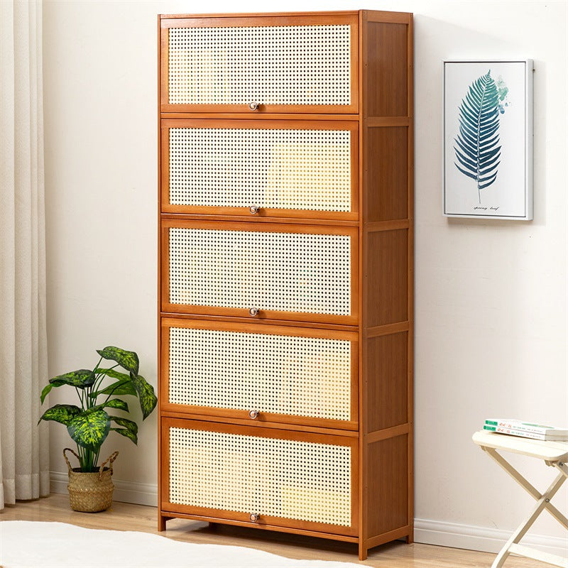 Storage chest with decorative rattan front and functional storage Bowlift