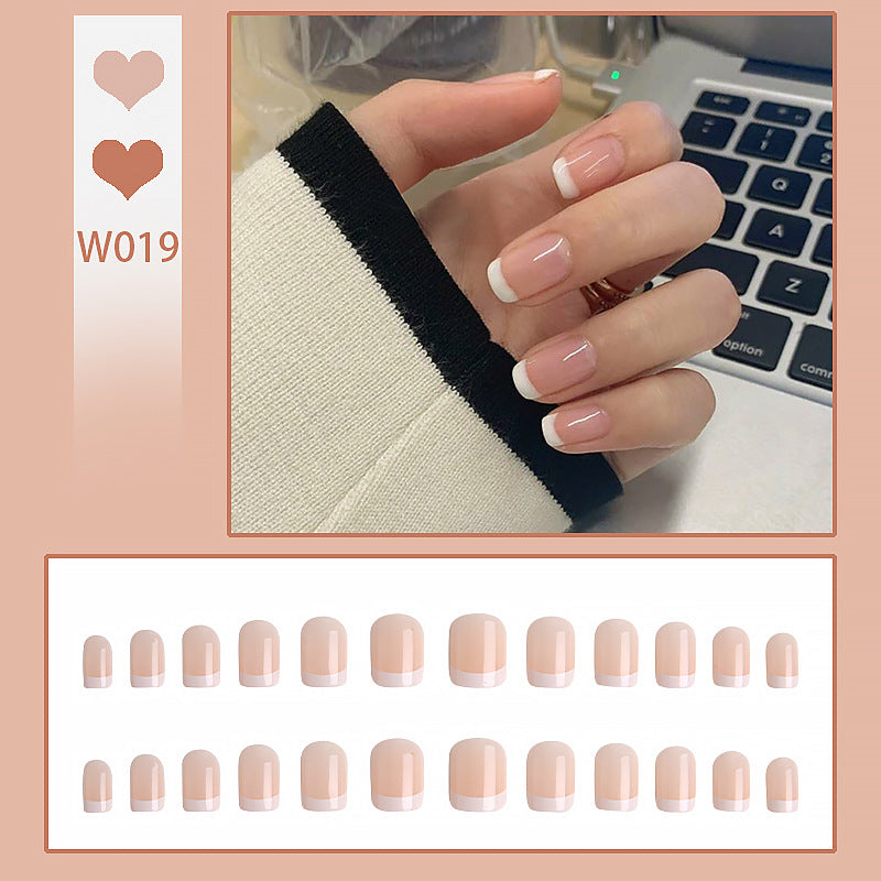 Artificial nail set with elegant French tips and natural shine Bowlift