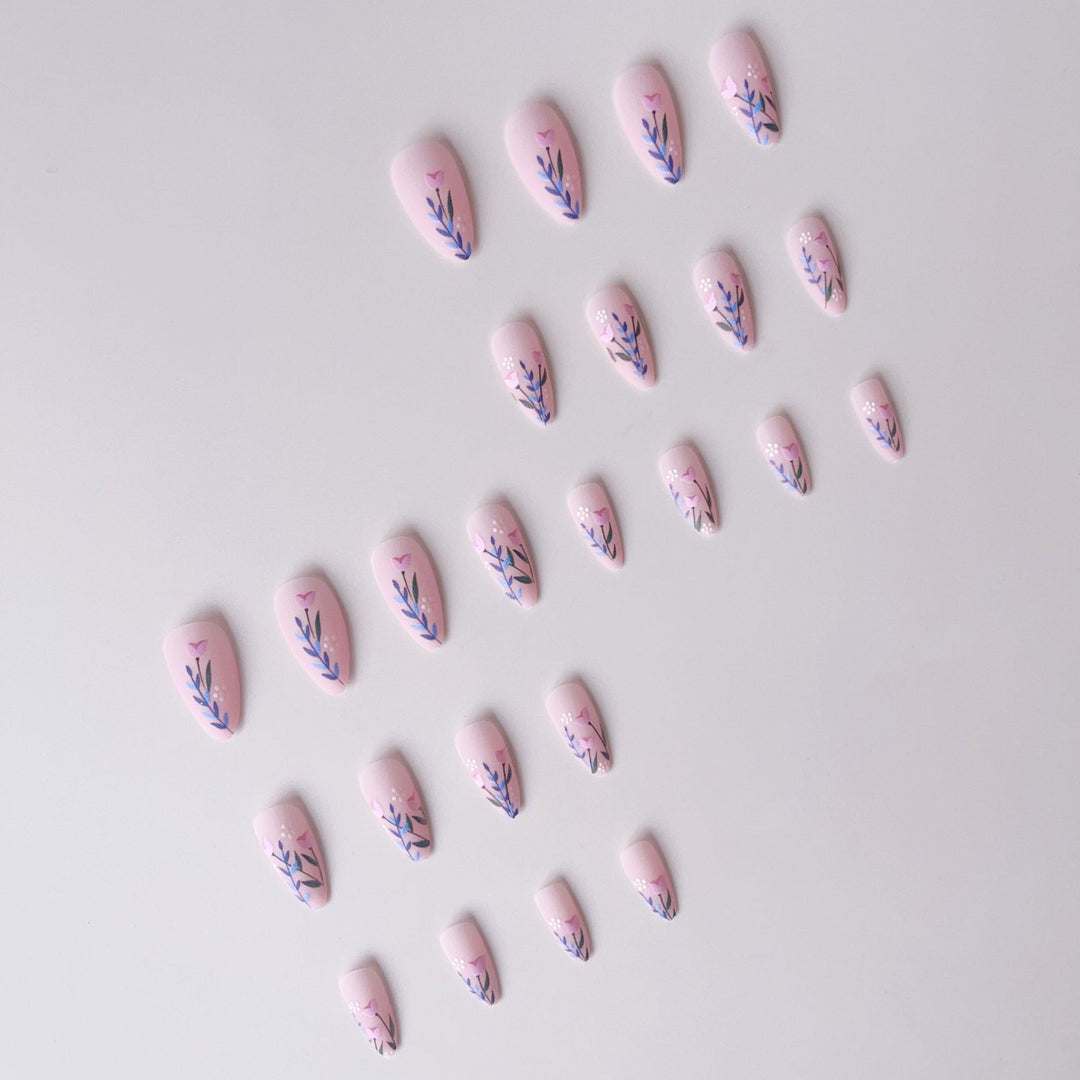Artificial nail set with floral motifs and embellished accents Bowlift