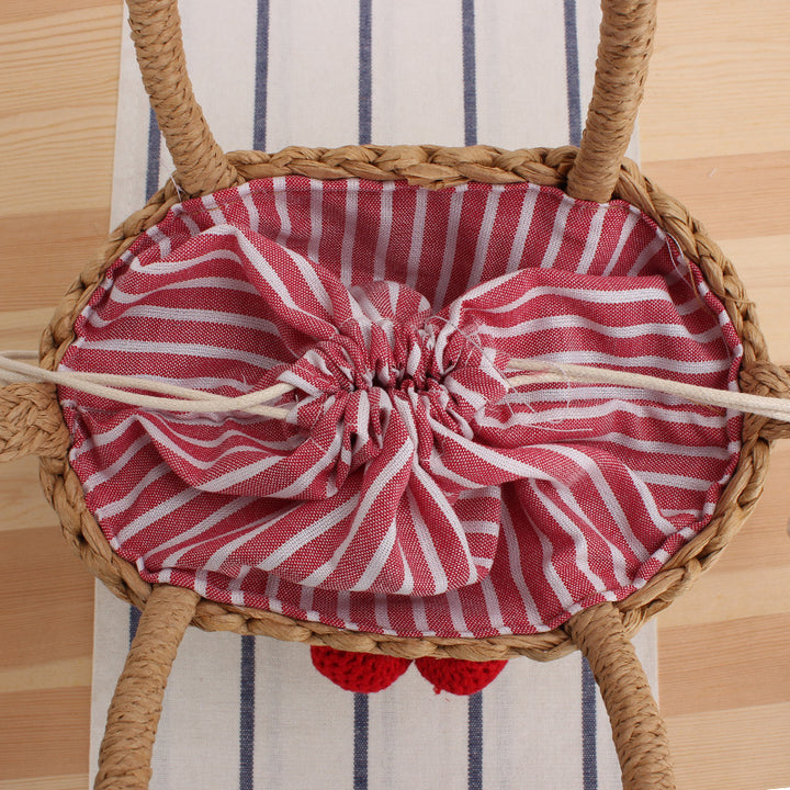 Basket bag with crocheted cherry design Bowlift
