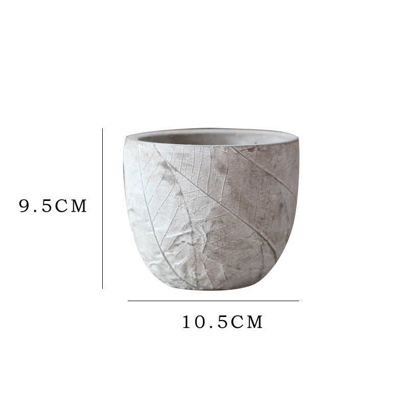 Decorative plant container made of handmade ceramic with leaf pattern Bowlift