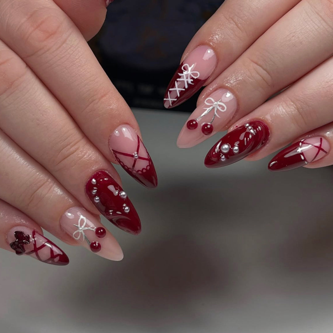 Artful acrylic nails with elegant floral accents Bowlift