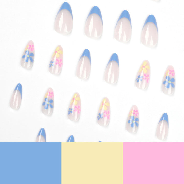 Artificial nail art with floral design and gradient Bowlift