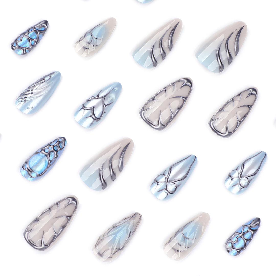 Artful stiletto nails with playful metallic details Bowlift