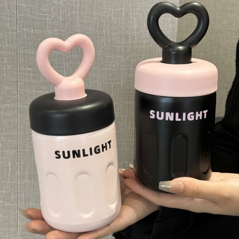 Women's practical drinking bottle with heart handle Bowlift