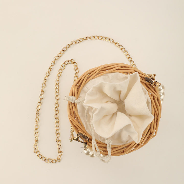 Women's elegant basket bag with pearl chain Bowlift