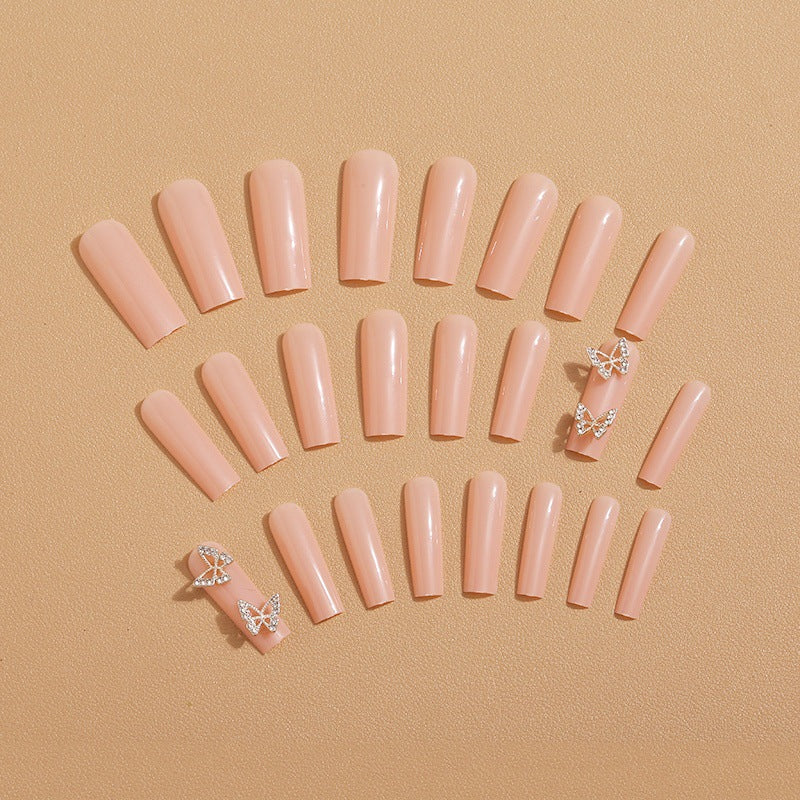 Artificial nails with butterfly accents and rhinestone decorations Bowlift