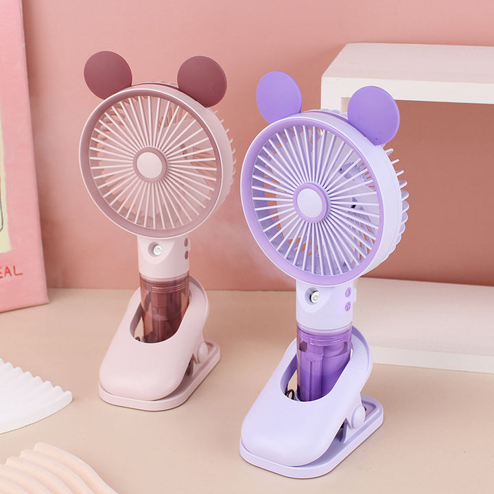 Cooling compact rechargeable clip-on misting handheld fan with detachable water reservoir and adjustable tilt Bowlift
