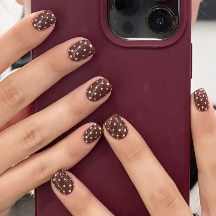 Acrylic nail set with stylish chocolate spots and elegant dots Bowlift