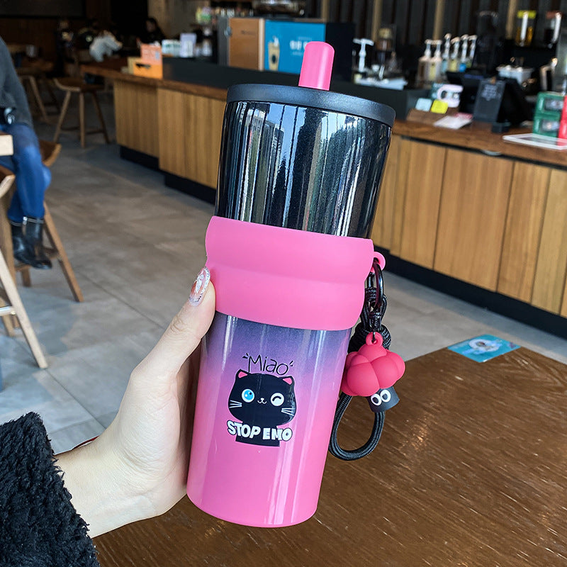 Women's playful coffee mug with silicone sleeve and integrated pendant Bowlift