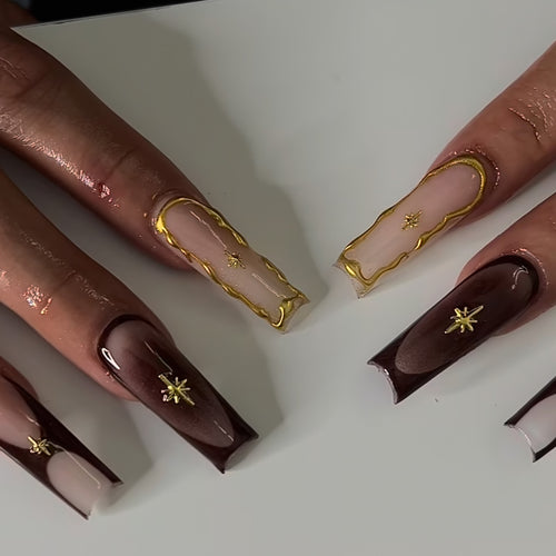 Artistic Long Press-On Nail Art Extensions with Gold Detailing Bowlift