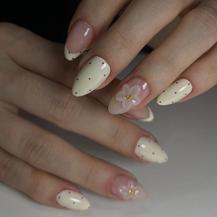 Creative nail art set with floral accents and glitter Bowlift