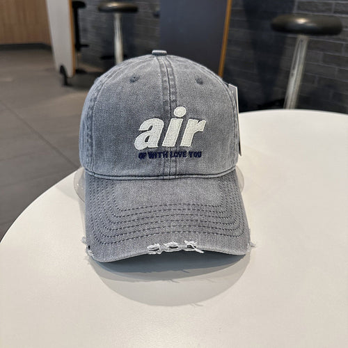 Distressed Denim Baseball Cap with Unique Embroidery